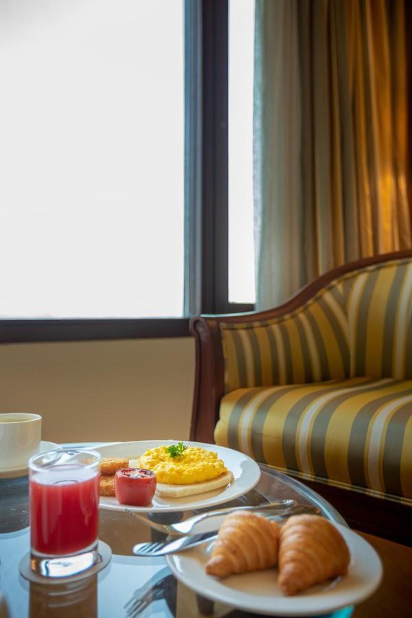 فندق ذا أوركيد مومباي المظهر الخارجي الصورة A settee