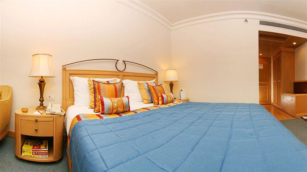 فندق ذا أوركيد مومباي المظهر الخارجي الصورة A bedroom at the hotel